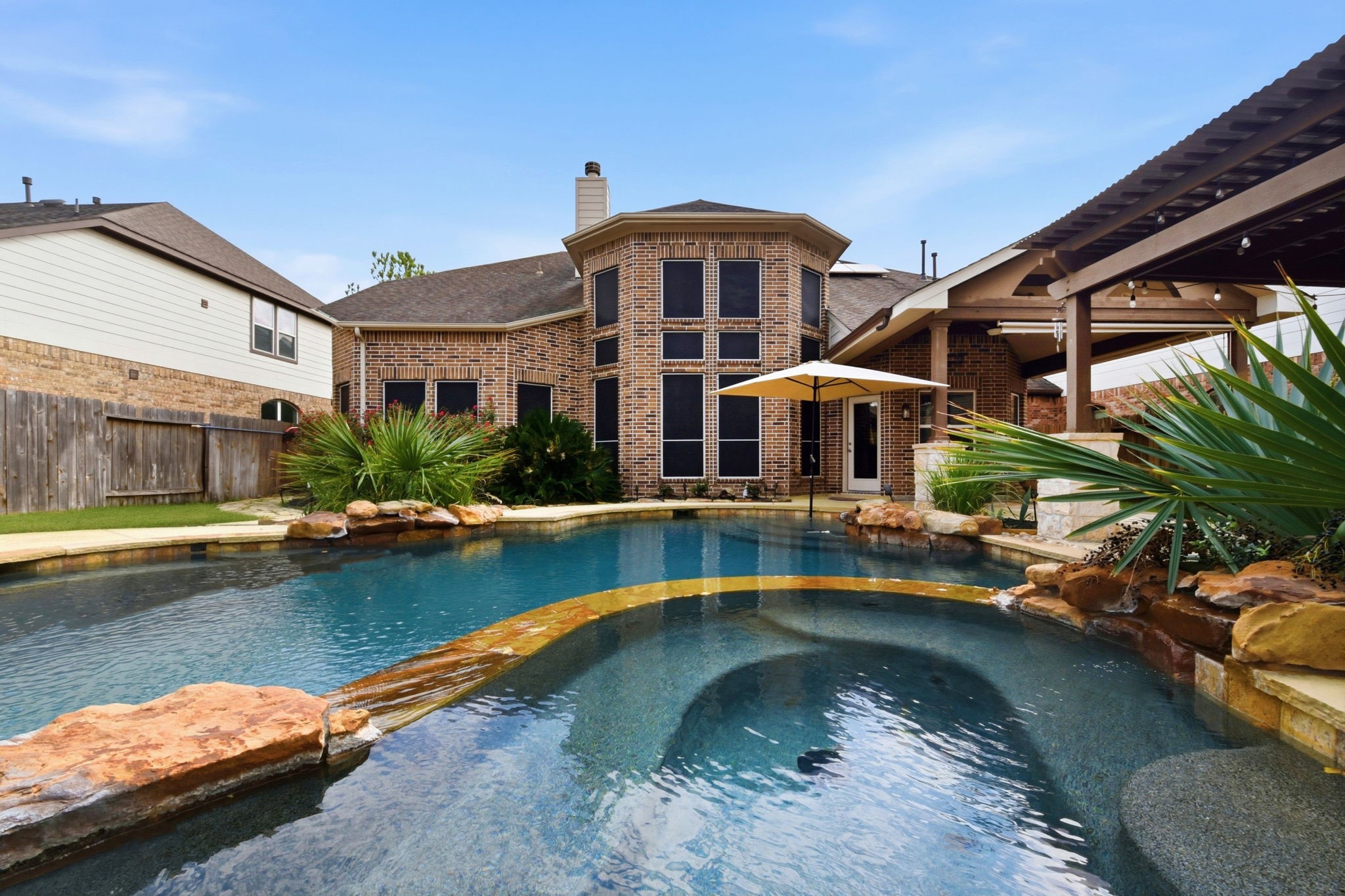 29019 Comal Karst Drive Spring, TX 77386 - Photo 46 of 50 a view of a patio with swimming pool table and chairs
