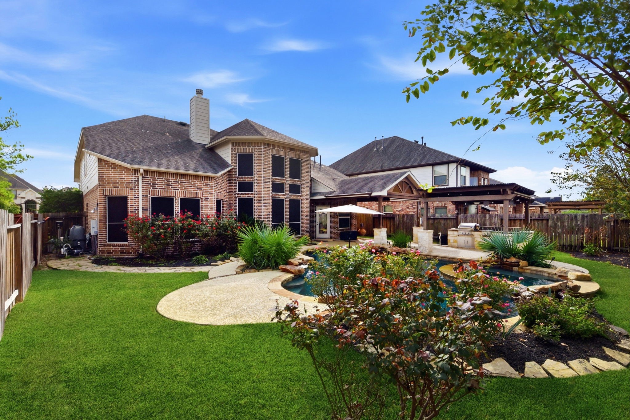 29019 Comal Karst Drive Spring, TX 77386 - Photo 47 of 50 a front view of a house with a garden
