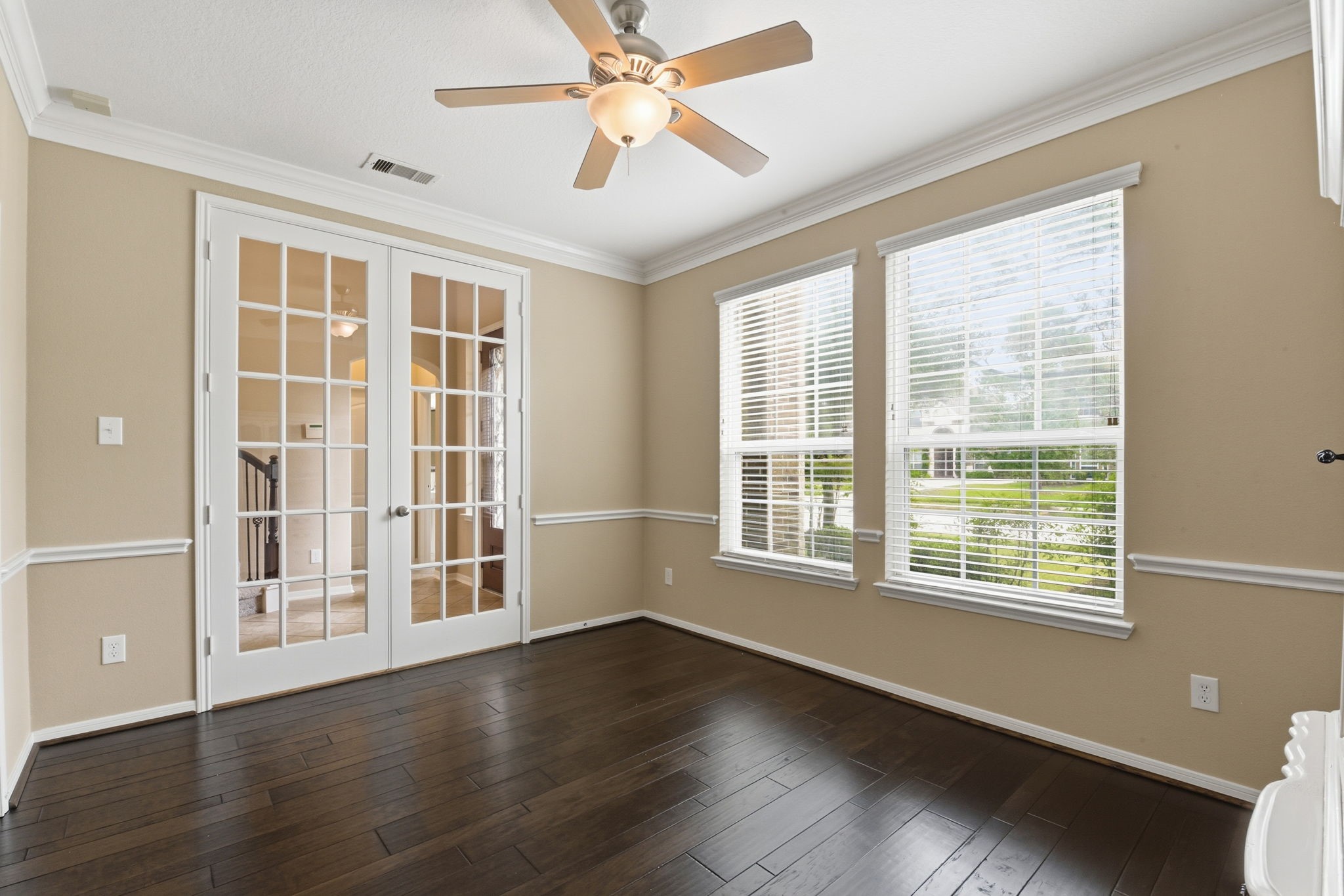 29019 Comal Karst Drive Spring, TX 77386 - Photo 10 of 50 a view of an empty room with wooden floor and a window