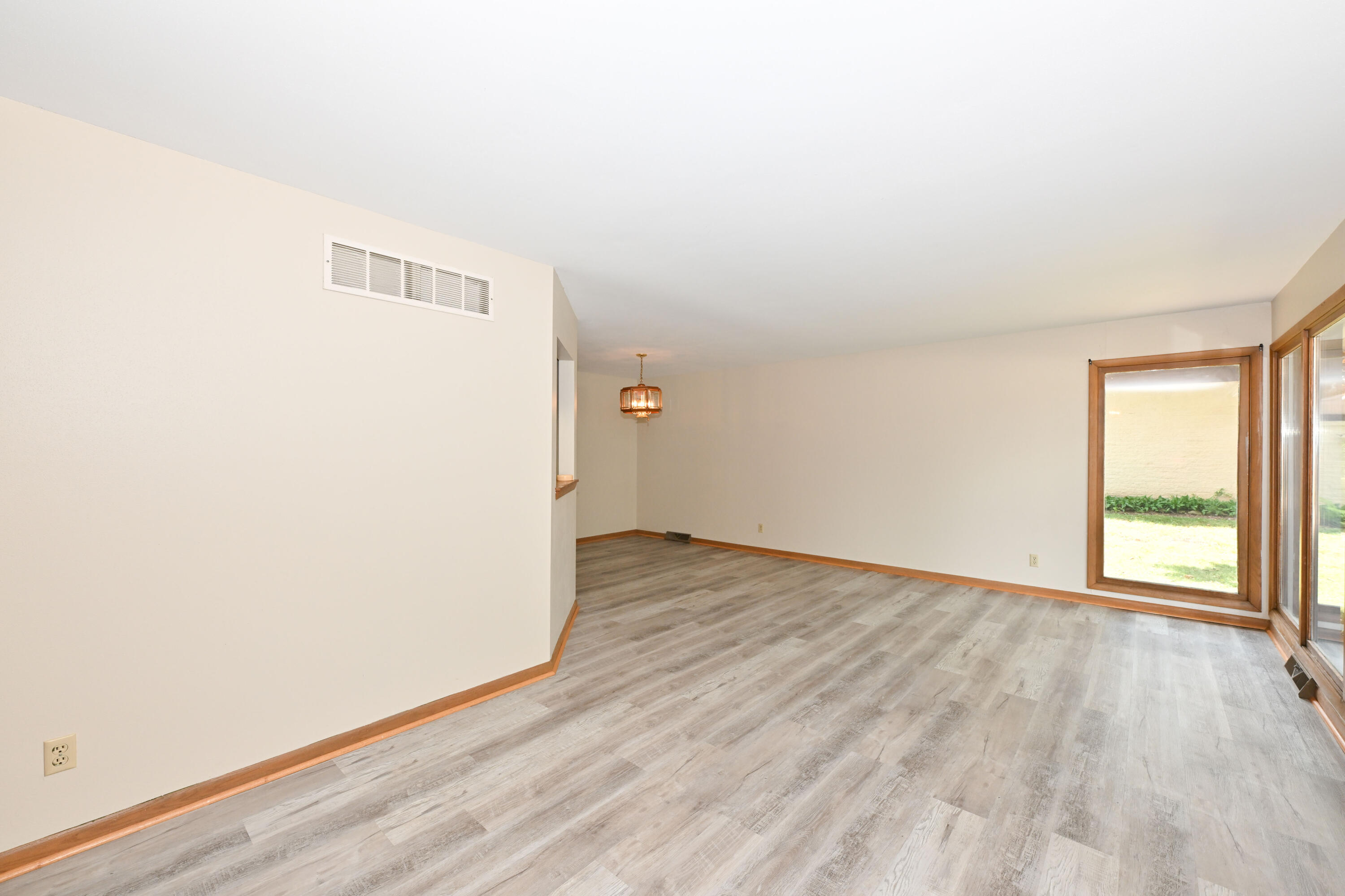 3660 South Joseph Road New Berlin, WI 53151 - Photo 4 of 30 Living Room to Dining zone