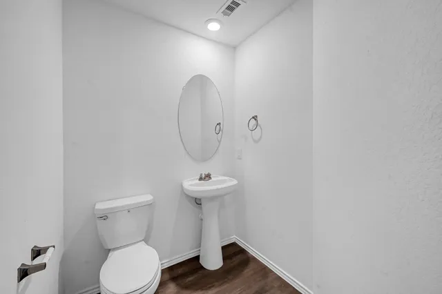 a view of bathroom with a toilet