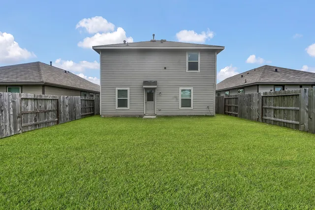 a view of a backyard with a garden
