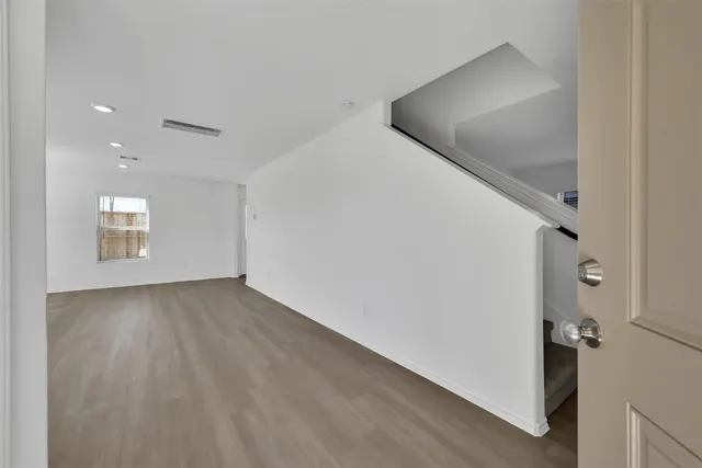 an empty room with windows