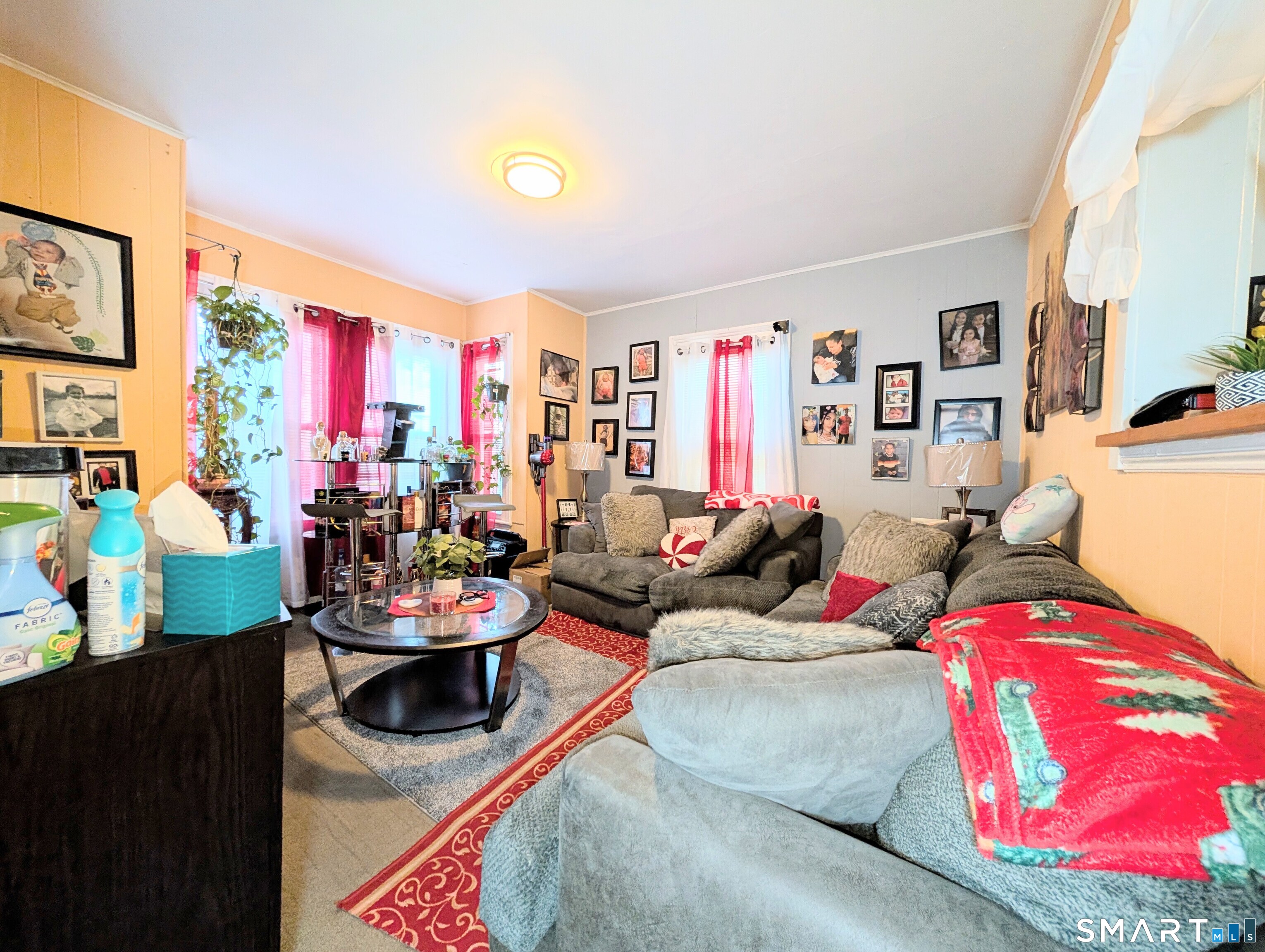 188 Holly Street Bridgeport, CT 06607 - Photo 11 of 33 a living room with furniture and a large window