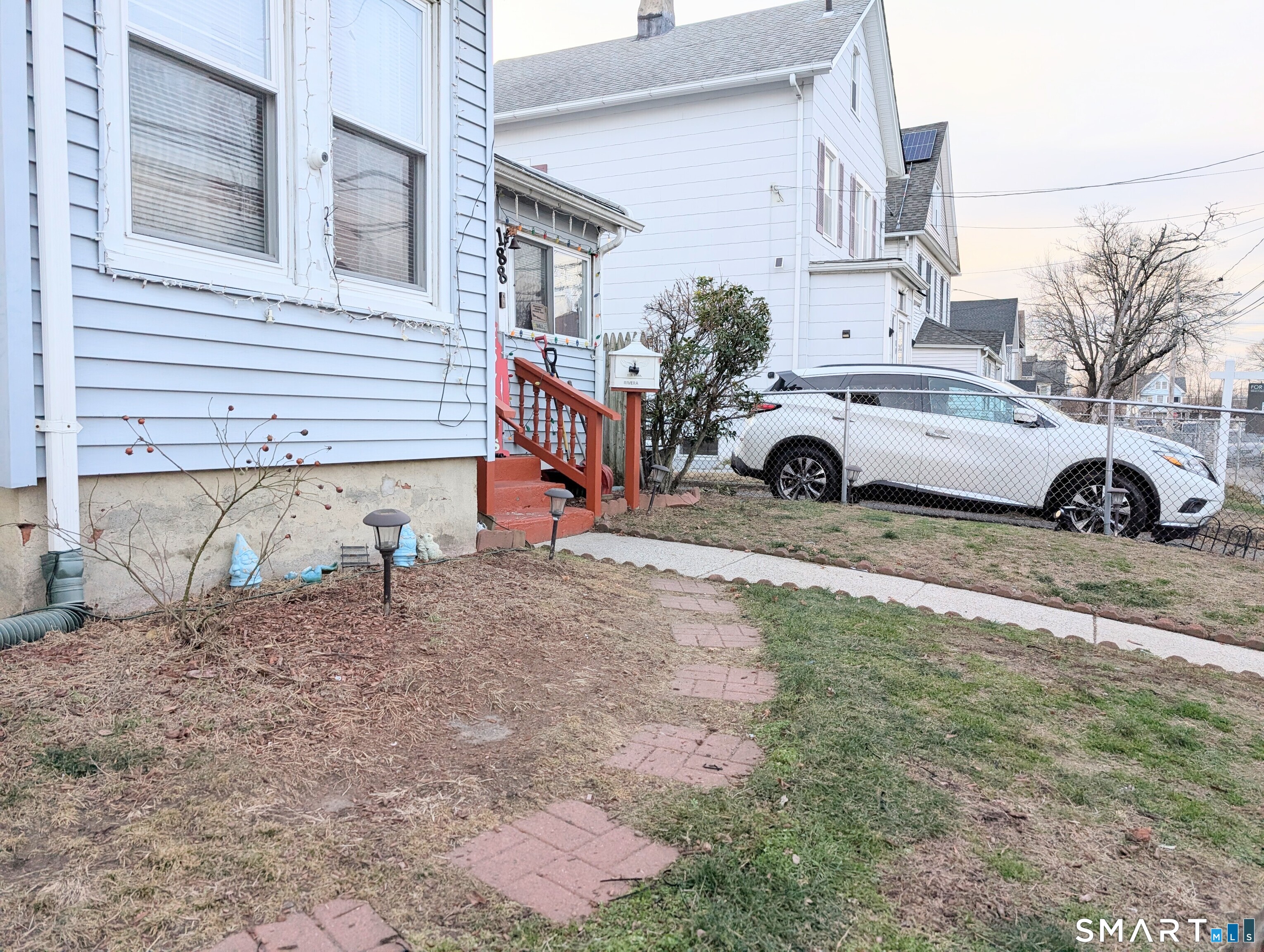 188 Holly Street Bridgeport, CT 06607 - Photo 3 of 33 a view of a car park in front of a house