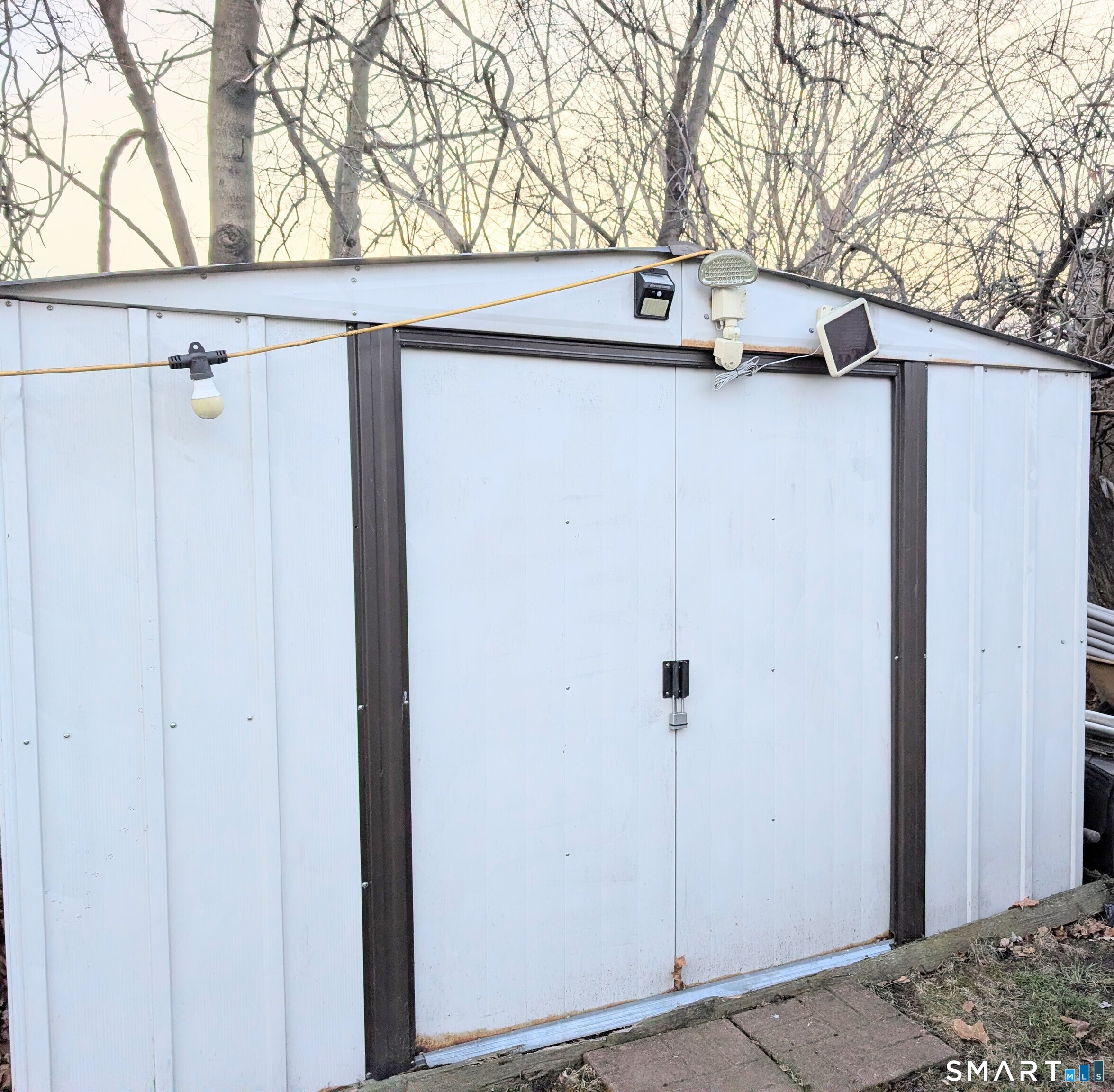 188 Holly Street Bridgeport, CT 06607 - Photo 6 of 33 a view of a house with a large tree