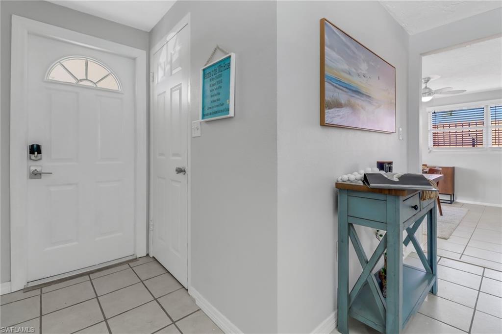 751 100th Avenue North Naples, FL 34108 - Photo 14 of 34 a workspace with furniture and a window