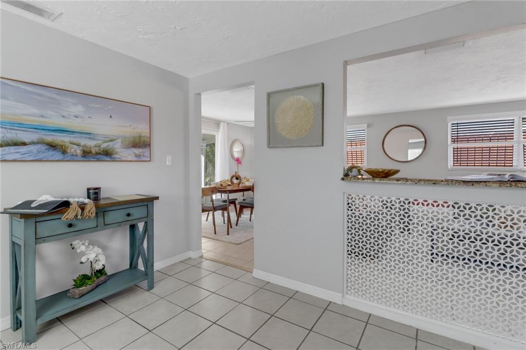 751 100th Avenue North Naples, FL 34108 - Photo 15 of 34 a living room with furniture
