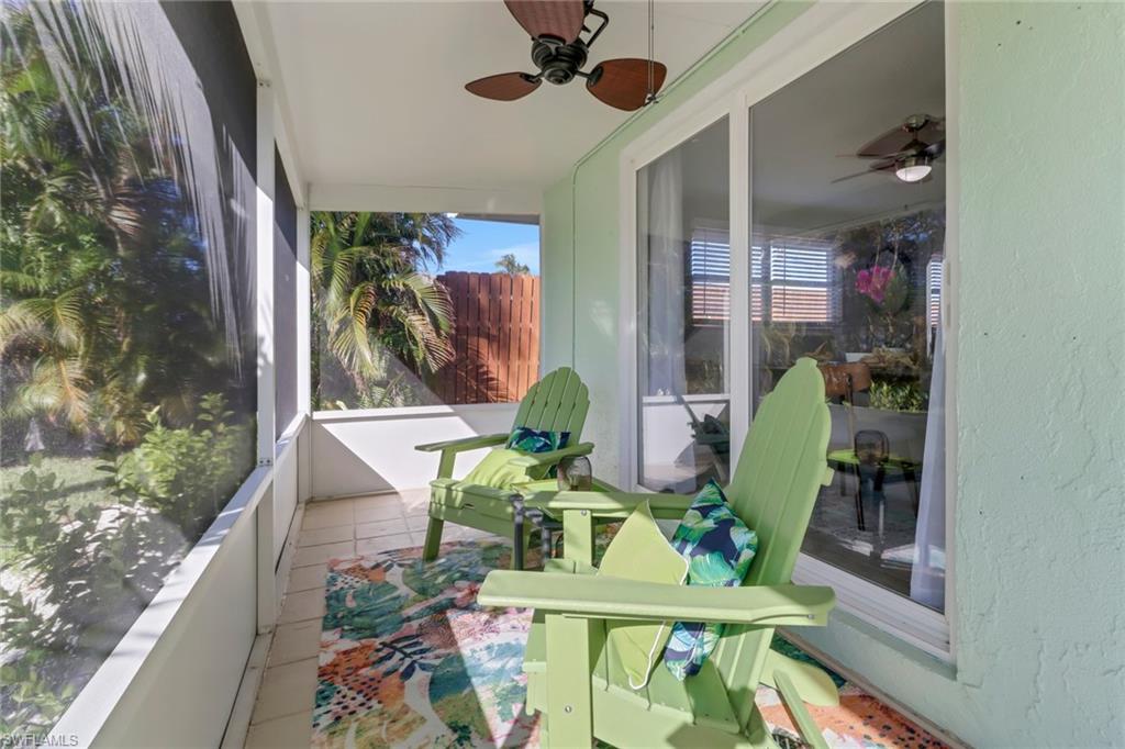 751 100th Avenue North Naples, FL 34108 - Photo 33 of 34 a dining room with furniture and wooden floor
