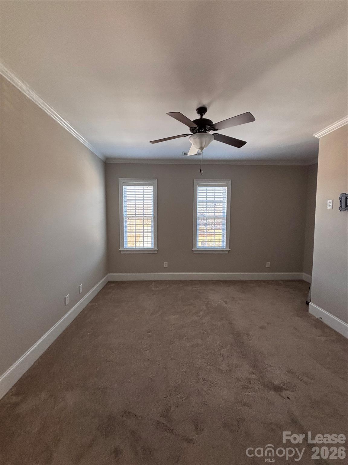 373 Dumbarton Street Concord, NC 28027 - Photo 11 of 18 a view of an empty room with a window