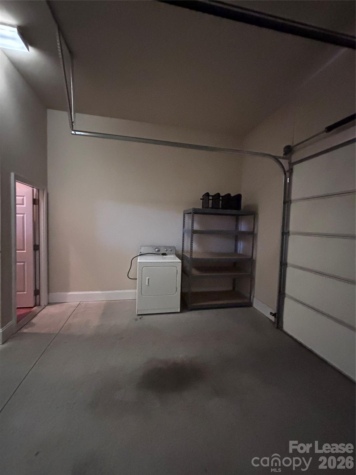 373 Dumbarton Street Concord, NC 28027 - Photo 6 of 18 a view of empty room with empty racks