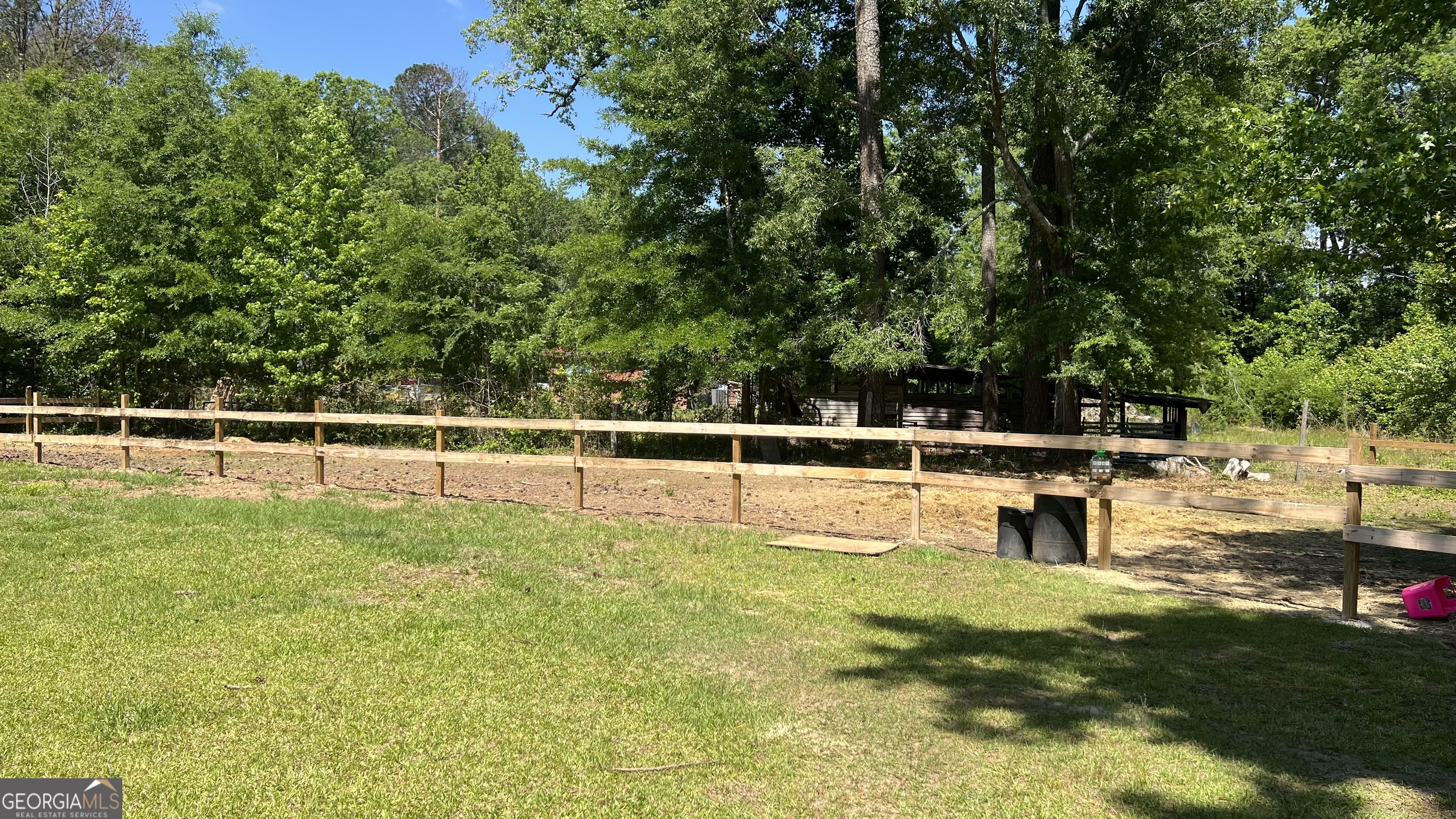 1065 Nathan Jones Road Harlem, GA 30814 - Photo 17 of 32 a view of a swimming pool with a yard and sitting area