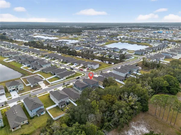 an aerial view of residential building with parking space