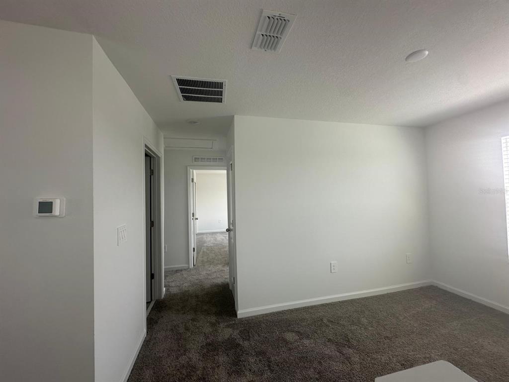 1559 Marksman Road Eagle Lake, FL 33839 - Photo 11 of 17 a view of a hallway