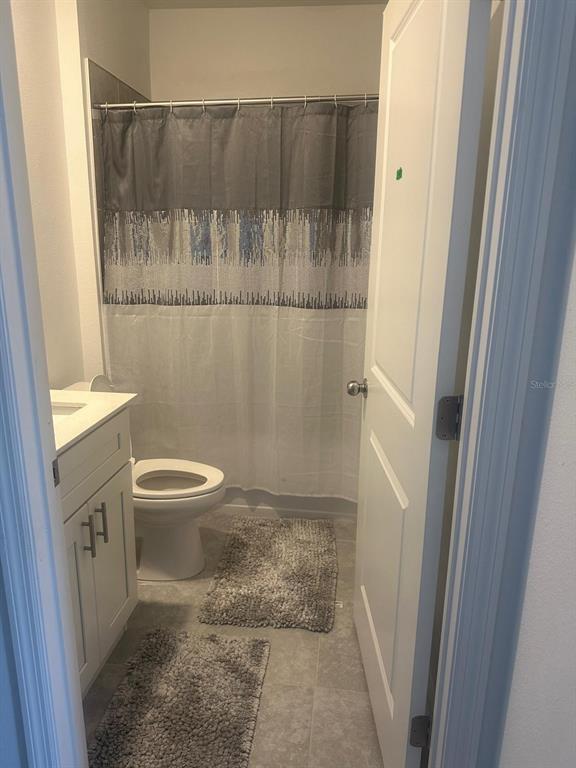 1559 Marksman Road Eagle Lake, FL 33839 - Photo 17 of 17 a bathroom with a toilet and a shower
