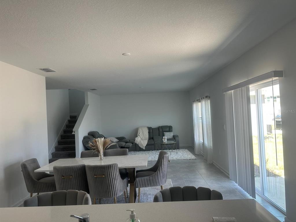 1559 Marksman Road Eagle Lake, FL 33839 - Photo 6 of 17 a view of a livingroom with furniture and window