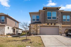 407 Epiphany Lane Pflugerville, TX 78660 - Photo 1 of 29 View of front of property featuring a garage and concrete driveway
