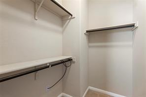 407 Epiphany Lane Pflugerville, TX 78660 - Photo 18 of 29 View of walk in closet