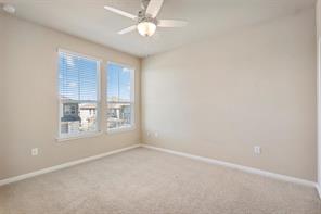 407 Epiphany Lane Pflugerville, TX 78660 - Photo 22 of 29 Spare room featuring carpet flooring and ceiling fan