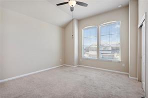 407 Epiphany Lane Pflugerville, TX 78660 - Photo 26 of 29 Unfurnished bedroom with a closet, carpet flooring, and ceiling fan