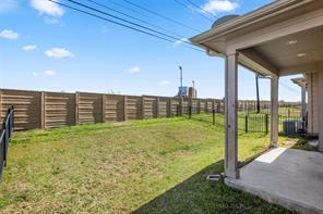 407 Epiphany Lane Pflugerville, TX 78660 - Photo 27 of 29 Fenced backyard featuring a patio area