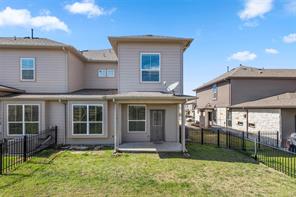 407 Epiphany Lane Pflugerville, TX 78660 - Photo 28 of 29 Rear view of property with a patio area and a fenced backyard
