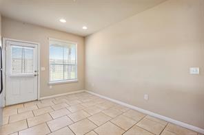 407 Epiphany Lane Pflugerville, TX 78660 - Photo 6 of 29 Unfurnished room featuring baseboards and recessed lighting