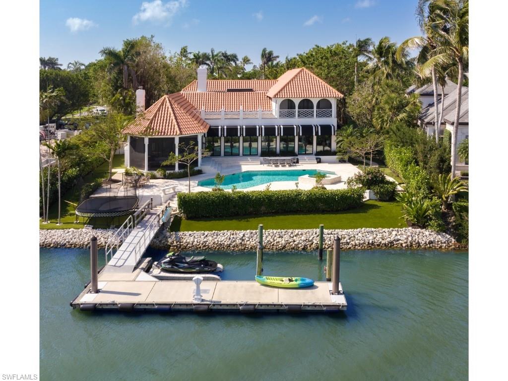 777 Kingstown Drive Naples, FL 34102 - Photo 1 of 18 a view of a house with pool