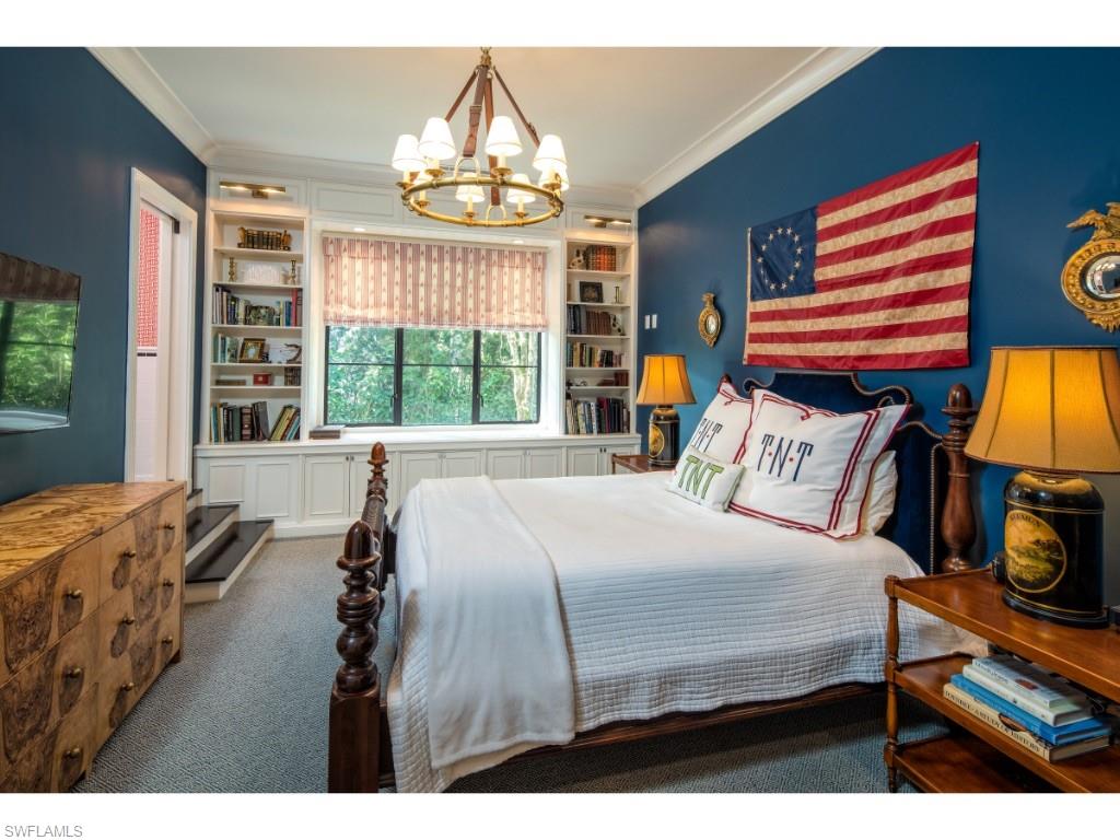 777 Kingstown Drive Naples, FL 34102 - Photo 13 of 18 a bedroom with a bed and a window