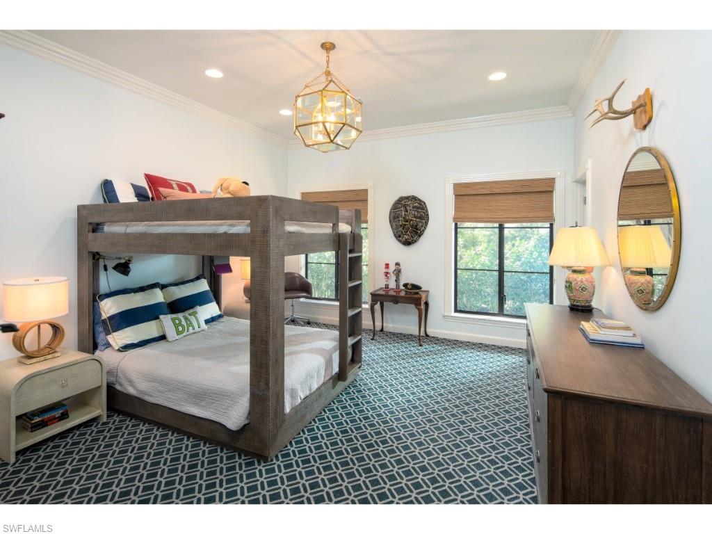 777 Kingstown Drive Naples, FL 34102 - Photo 14 of 18 a living room with furniture and a window