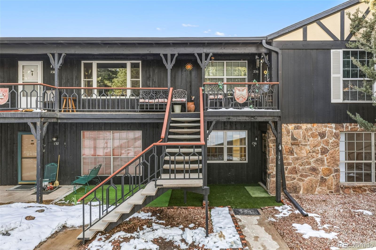 a front view of a house with a porch