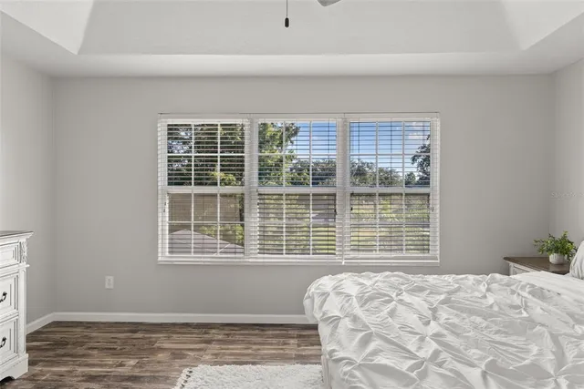 a work room with furniture and a window