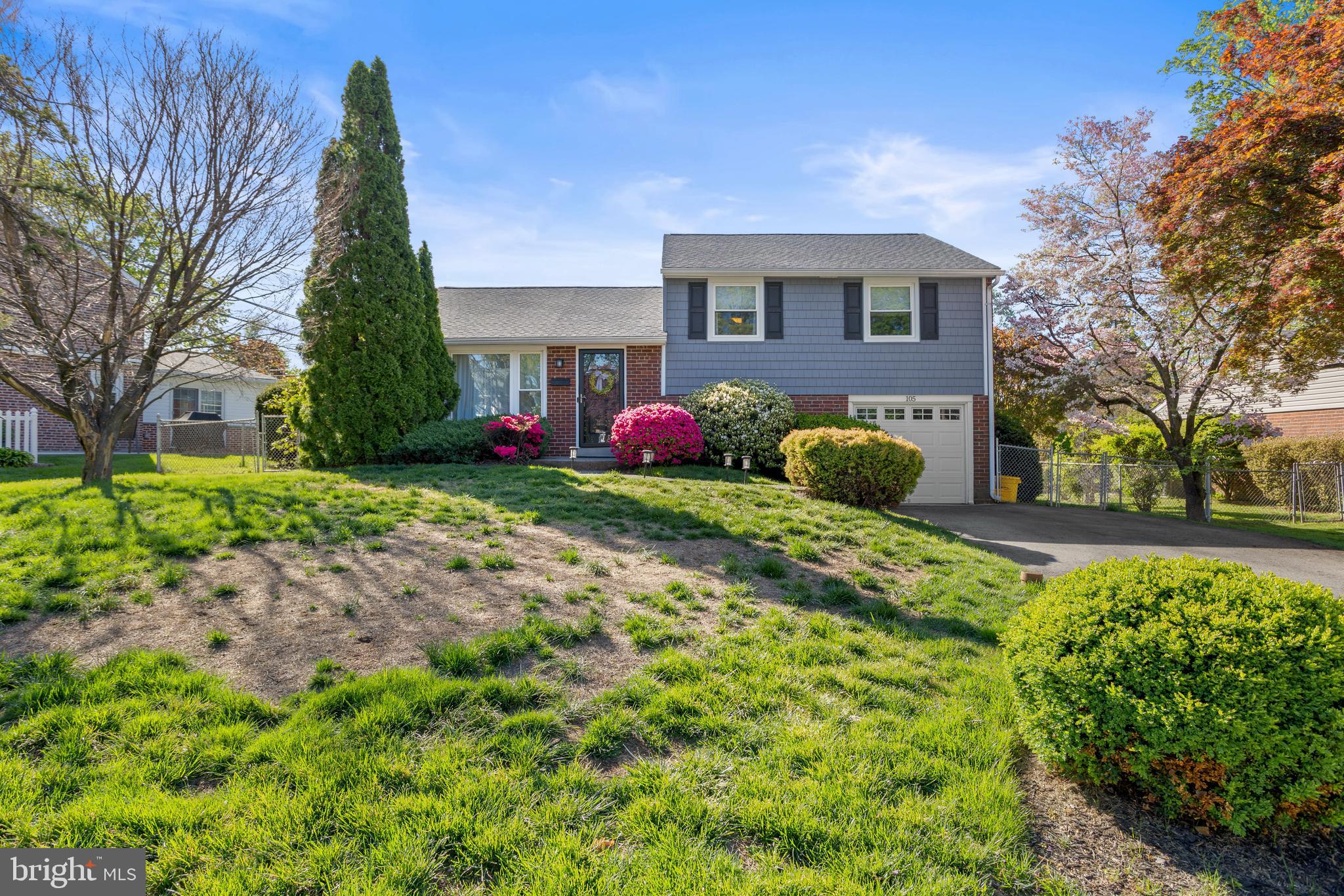 a front view of house with yard