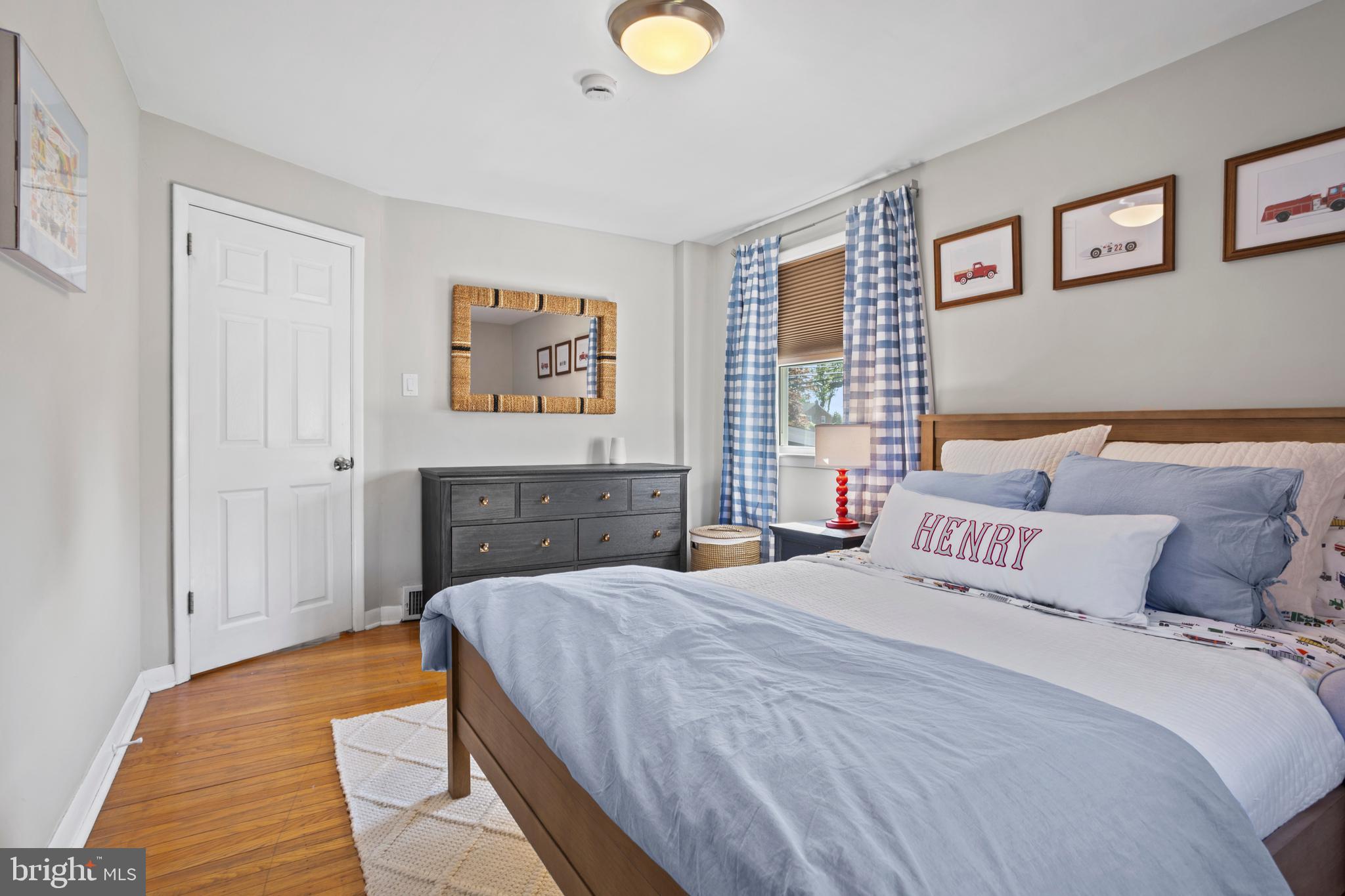 105 Longview Drive Springfield, PA 19064 - Photo 20 of 33 a bedroom with a bed and a window