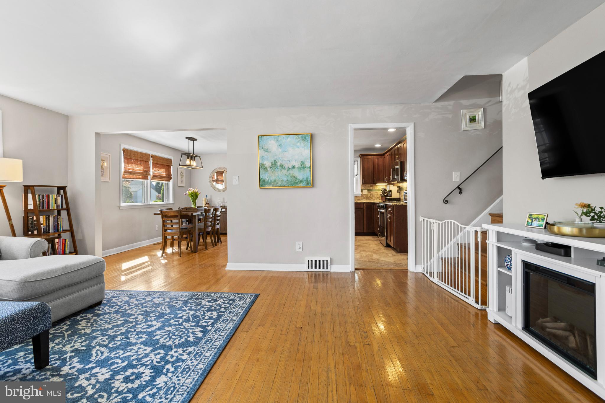 105 Longview Drive Springfield, PA 19064 - Photo 6 of 33 a living room with furniture and a flat screen tv