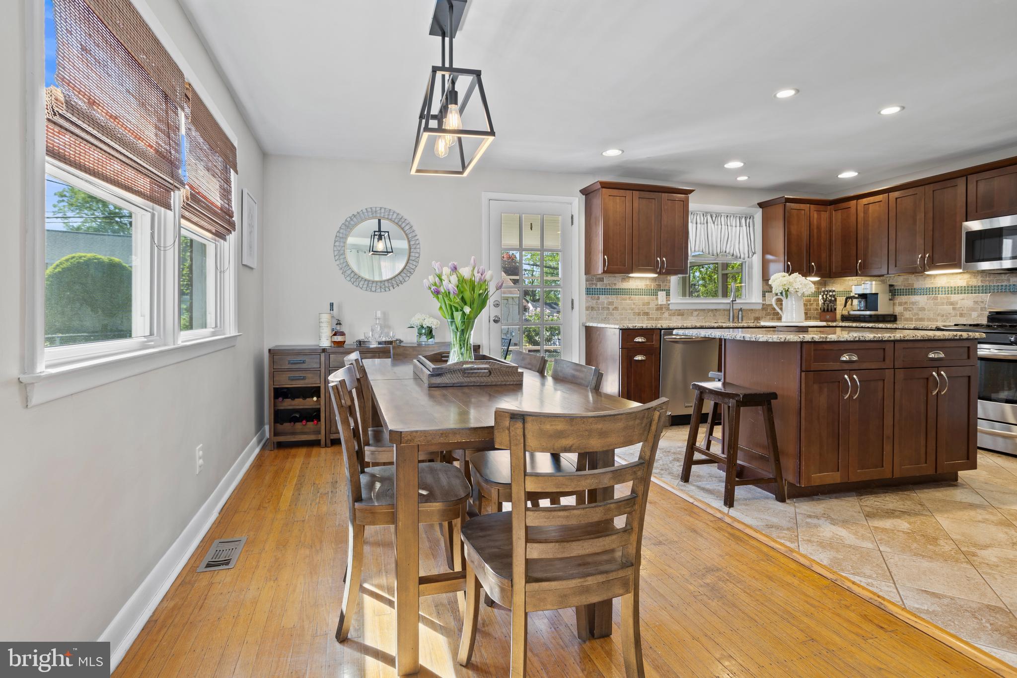 105 Longview Drive Springfield, PA 19064 - Photo 8 of 33 a view of a dining room with furniture window and wooden floor