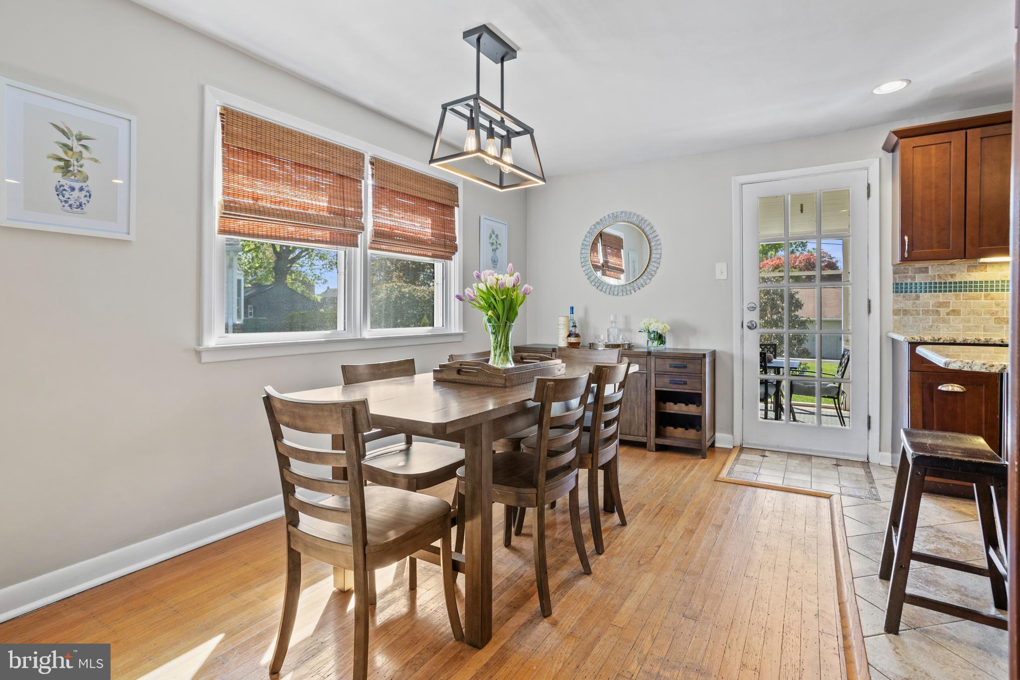 105 Longview Drive Springfield, PA 19064 - Photo 9 of 33 a view of a dining room with furniture window and wooden floor