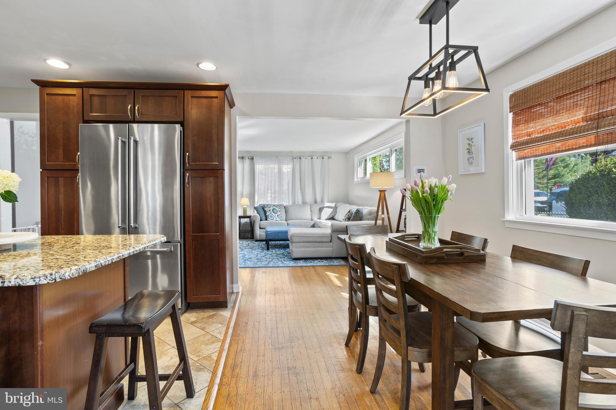 105 Longview Drive Springfield, PA 19064 - Photo 10 of 33 a view of a dining room with furniture window and wooden floor