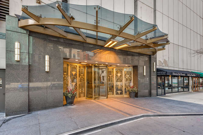 111 East Chestnut Street, Unit 22H Chicago, IL 60611 - Photo 2 of 27 a view of a building with door