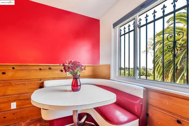 a bedroom with furniture and wooden floor