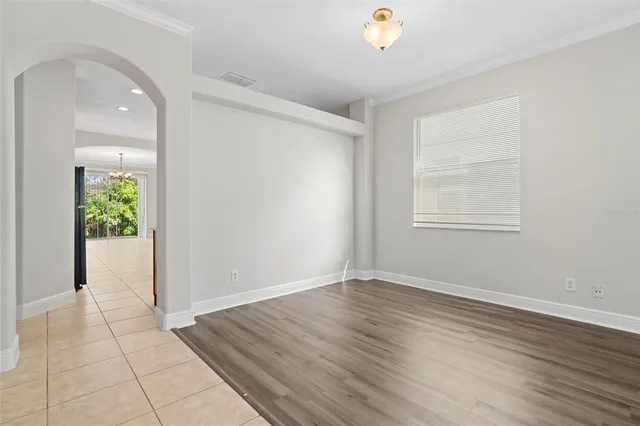 a kitchen with stainless steel appliances granite countertop wooden cabinets a sink and a stove