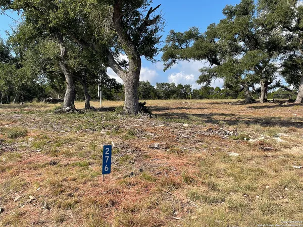 a fire hydrant in the middle of a field