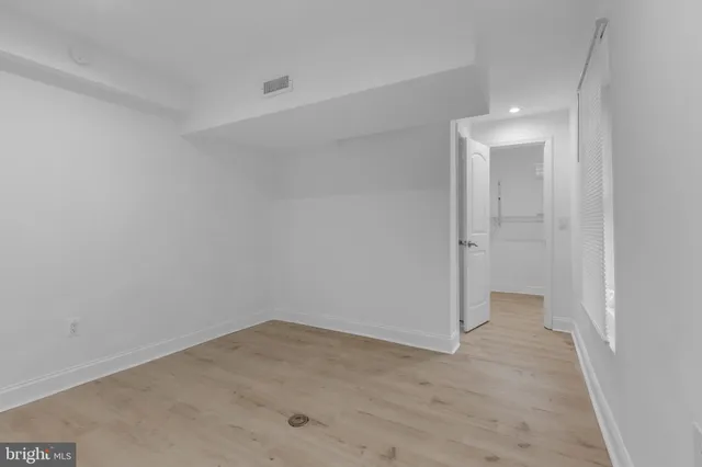 a view of a room with a hallway