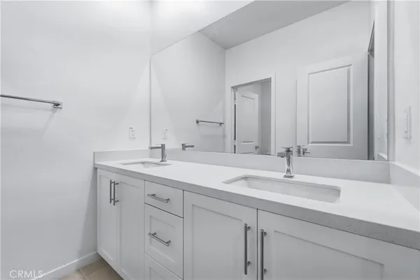 a bathroom with a toilet and a bathtub