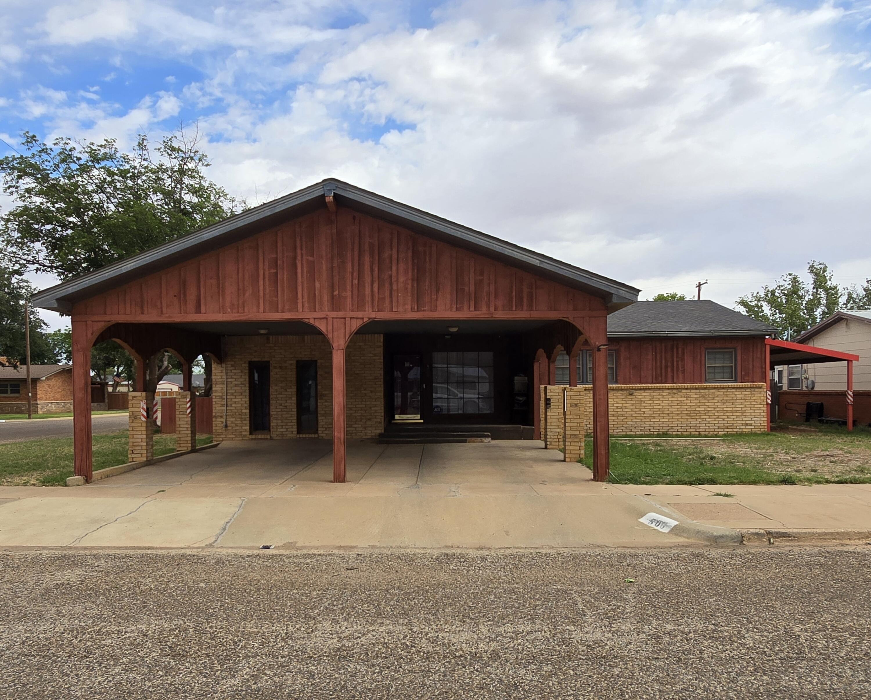 506 North 19th Street Lamesa, TX 79331 - Photo 29 of 29 a front view of a house with yard