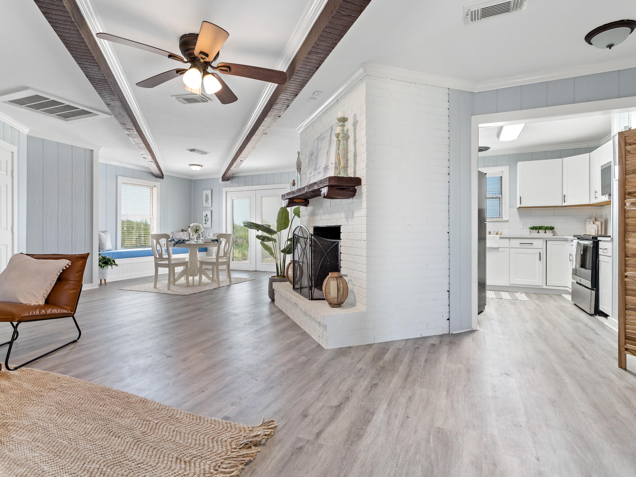 2055 State Highway 87 Crystal Beach, TX 77650 - Photo 32 of 32 a living room with furniture and a kitchen view