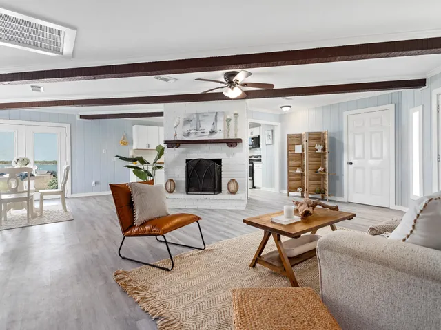 a view of a house with pool and a yard