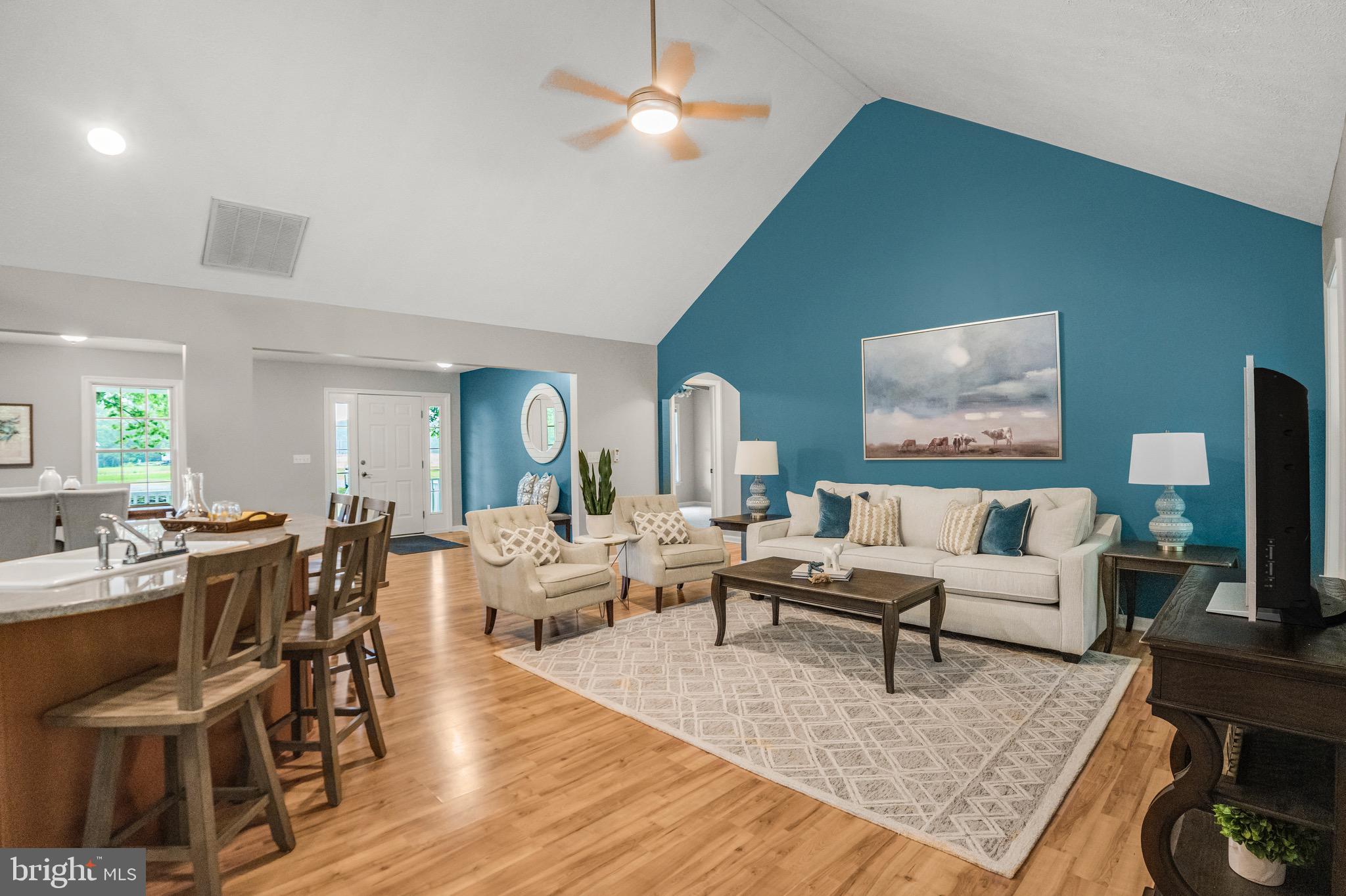 21549 Point Lookout Road Callaway, MD 20620 - Photo 41 of 41 a living room with lots of furniture and a wooden floor
