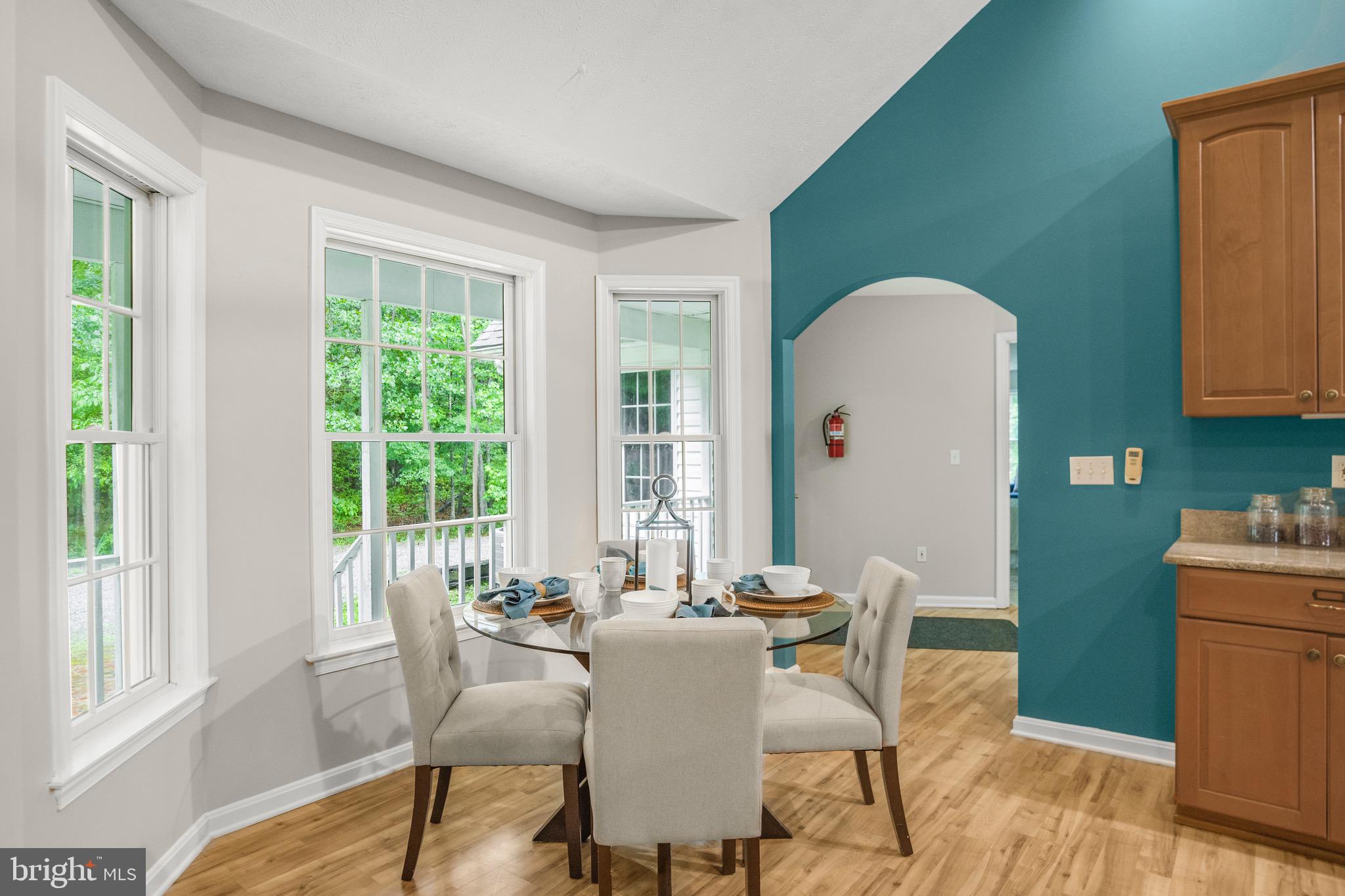 21549 Point Lookout Road Callaway, MD 20620 - Photo 15 of 41 a view of a dining room with furniture window and outside view