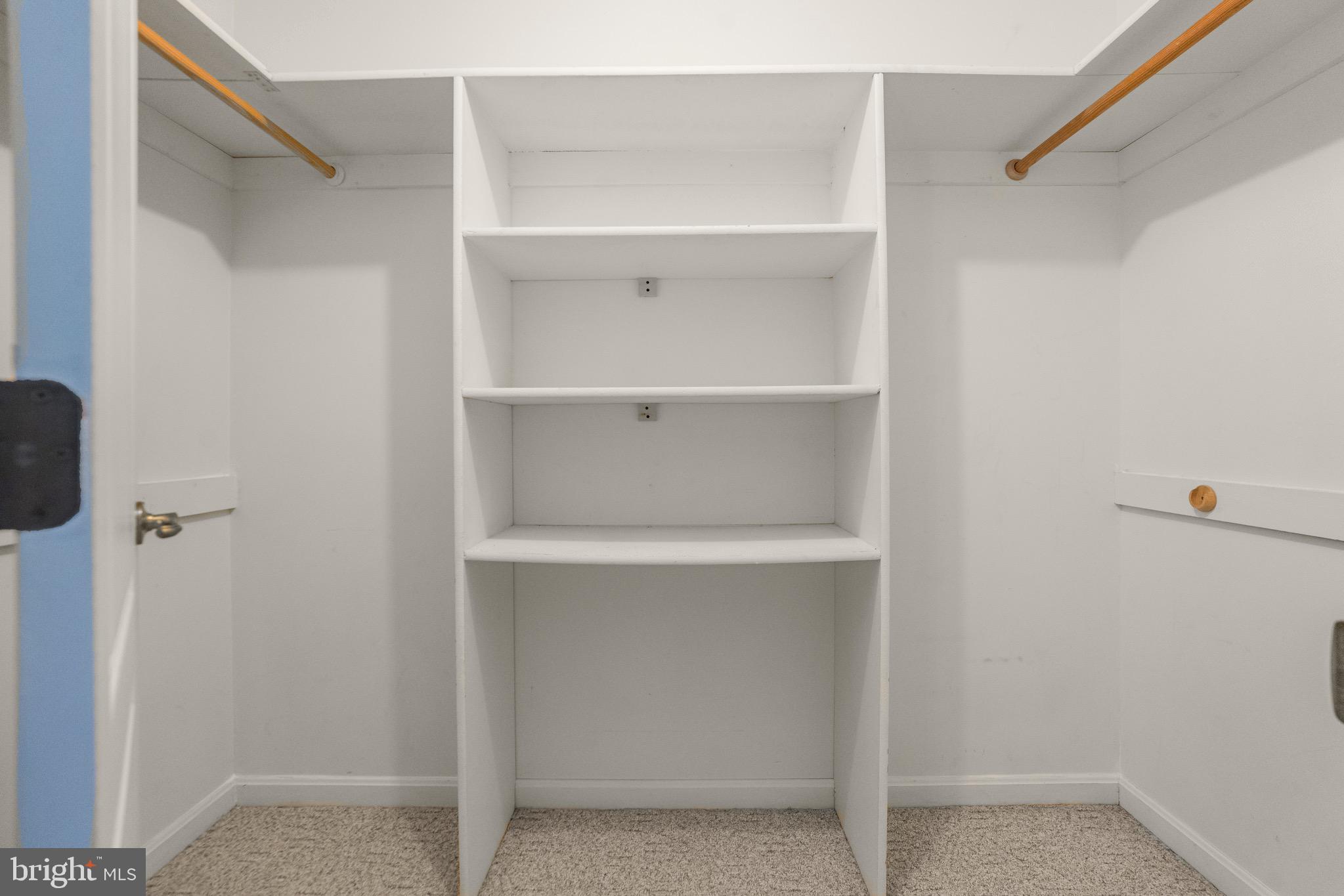 21549 Point Lookout Road Callaway, MD 20620 - Photo 18 of 41 a view of an empty walk in closet